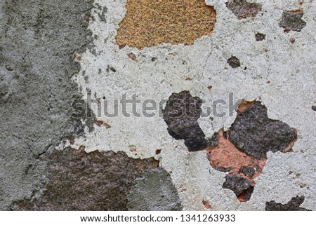 Close up surface of aged and weathered paint on different walls in high resolution