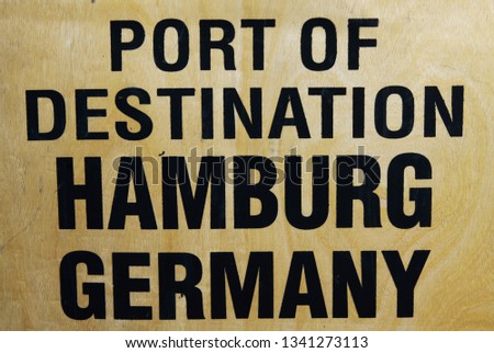 Port of destination Hamburg Germany printed on wooden transport box