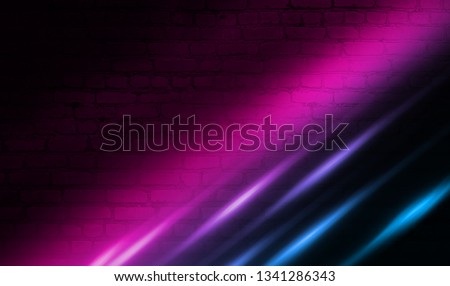Brick wall background, neon light, blue and purple rays. Futuristic Abstract Background
