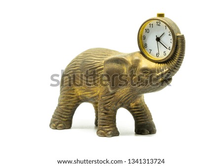 isolated bronze elephant with a clock on a white background