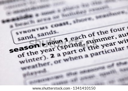 Blurred close up to the partial dictionary definition of Season