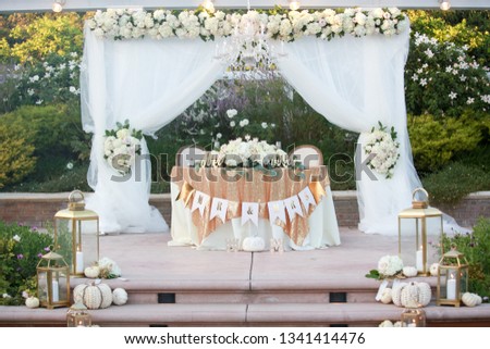 Elegant sweetheart table at a wedding Royalty-Free Stock Photo #1341414476