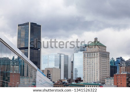 Montreal skyline, with the iconic buildings of the old Montreal (Vieux Montreal) and the CBD business skyscrapers taken from the port. Montreal is the main city of Quebec, and the 2nd city in Canada