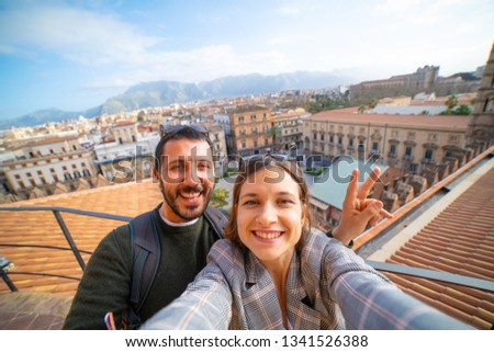 happy tourist taking selfie with panorama of Palermo, Sicily, Italy