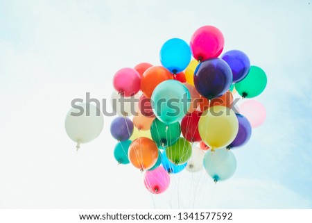 image of colorful balloons with sky background
