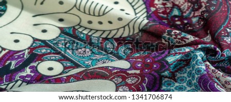Background texture. cotton women scarf black and white pattern on one side of the scarf and color paisley pattern on the other side