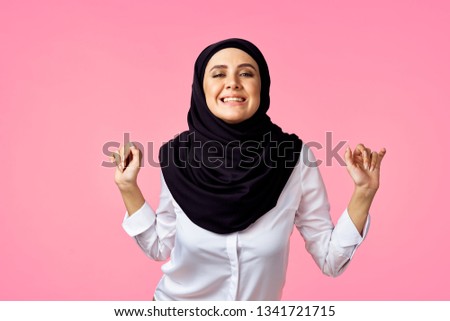  joyful woman on pink background                              