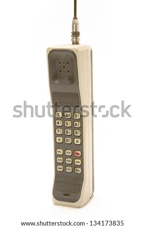 Early 1990's Style Mobile Phone. One of the first models ever made.  Isolated on white background. Royalty-Free Stock Photo #134173835