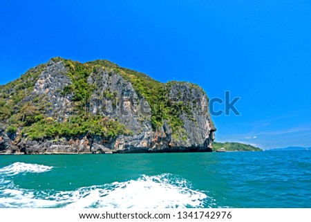 Island on blue sky