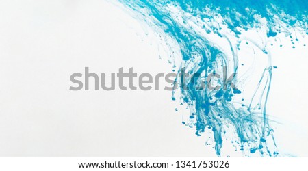 Blue abstract stains on white background, copy space. Abstract modern art concept