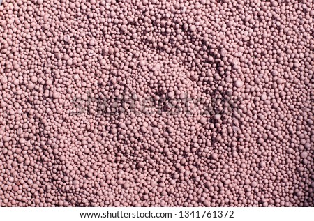 Fertilizer for the garden with minerals. Nitrates for rapid plant growth. Beautiful texture. Stock background, photo