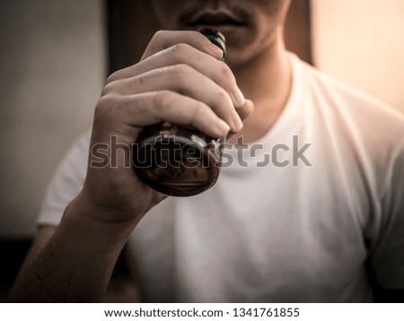Man drinking alcohol in critical condition, lonely and hopeless, Poverty problems stressful conditions and depression needing help, living at risk of poor mental health and physical problems crime.