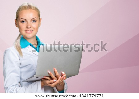 Woman doctor with laptop