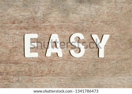 Alphabet letter in word easy on wood background