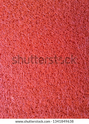 Red carpet on floor closeup