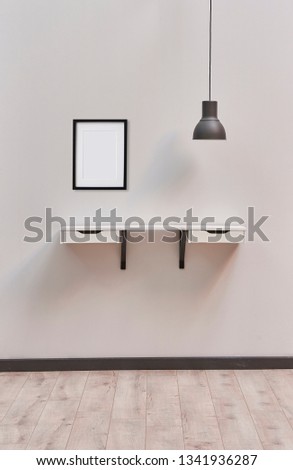 White wall shelf and frame style, black lamp with carpet.