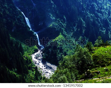 Waterfall Stauber or Wasserfall Stäuber, Brunnibach stream in the Alpine Valley of Maderanertal - Canton of Uri, Switzerland