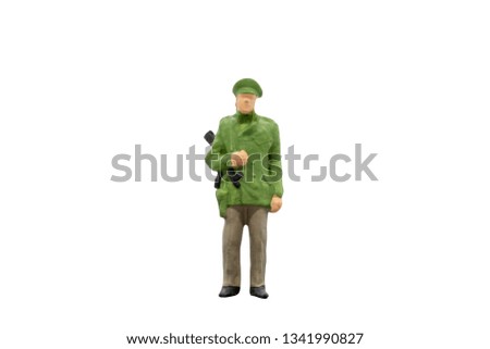 Miniature people : Policeman standing on white background with clipping path