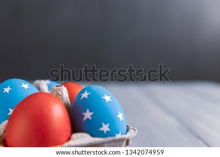 american easter concept. Easter eggs painted in the style of the American flag.