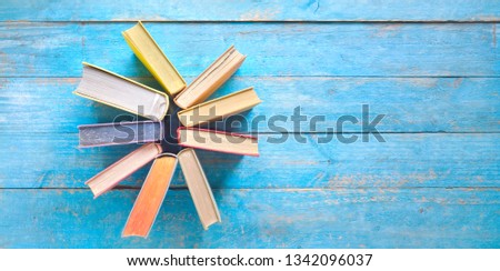 Arrangement of books, flat lay, free copy space. Reading, learning, literature concept. 