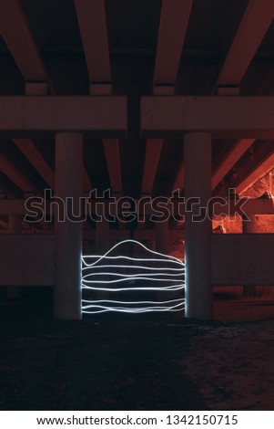 Drawn by the light under the post of the barrier between two pillars