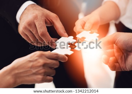 Business Teamwork The success of the organization's professional team collaboration and leadership. Development practitioners, business clients understand the market dynamics and development. Royalty-Free Stock Photo #1342212014