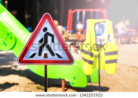 Concept territory of a game of children and foot walks. Children's playground. pedestrian  sign