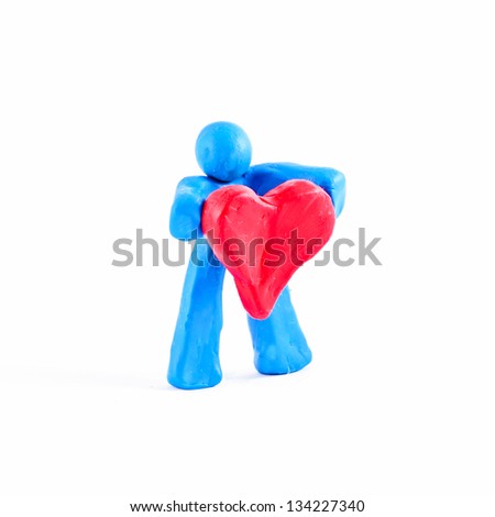 Persons In Love Cut Out in Molding Dough isolated on white