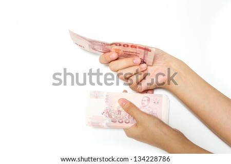 Hand with money on a white background