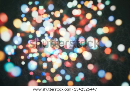 Bokeh abstract texture. Colorful. Defocused background. Blurred bright light. Circular points.