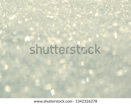 abstract white background colorful blurred christmas light garland snow