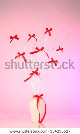 Composition from bows on pink background