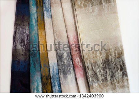 Colorful curtain fabric samples. Multiple color fabric texture samples selection fabrics for interior decoration. Curtains, tulle and furniture upholstery
