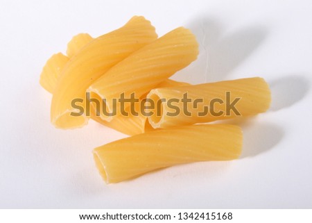 raw pasta and white background