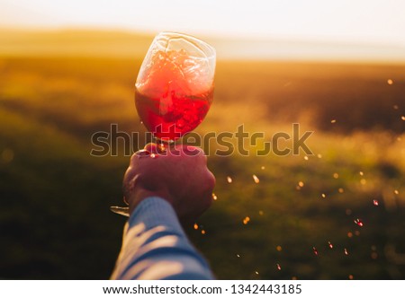Splashes of wine flowing from a glass