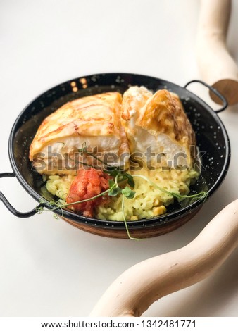 Omelet with basmati rice and tomatoes with empty postcard for your text. High resolution picture perfect for cooking book, receipt book or food magazine.