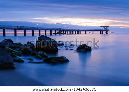 Before sunrise Burgas bay with rocks in foreground - image