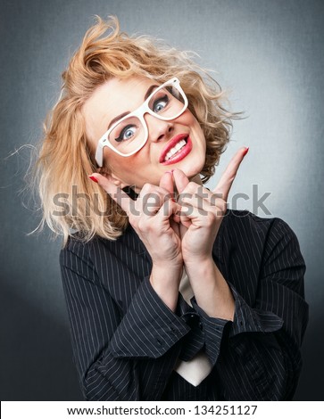 Busineswoman have the idea. Female with finger up, expression face