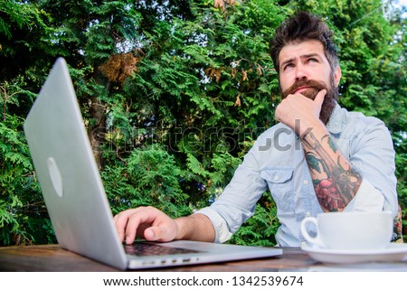 Man looking for inspiration. Find topic write. Bearded hipster laptop surfing internet. Reporter journalist daily routine. Working online. Online mass media worker. Write article for online magazine.