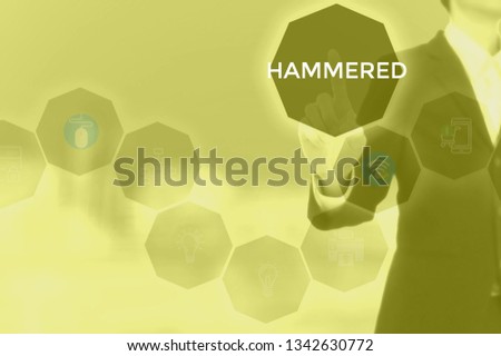 HAMMERED - technology and business concept