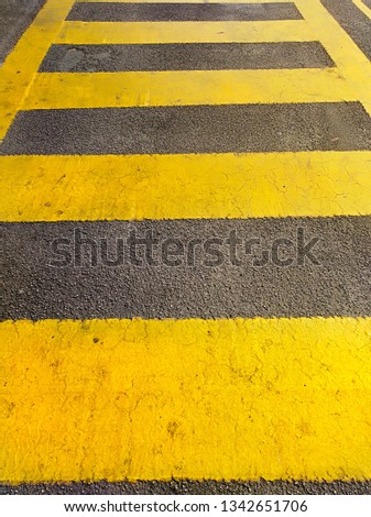 A picture of safety zebra crossing in a factory.