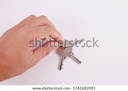 hand holding the key