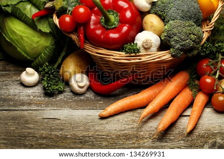 organic food background Vegetables in the basket Royalty-Free Stock Photo #134269931
