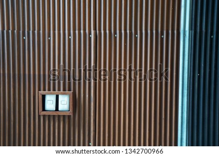 Wooden Lighting switch box decorated in metal zinc sheet wall