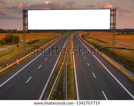 Blank white billboard over the highway
