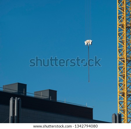 Tower crane hoist blue sky background image