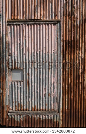 An old corrugated steel wall