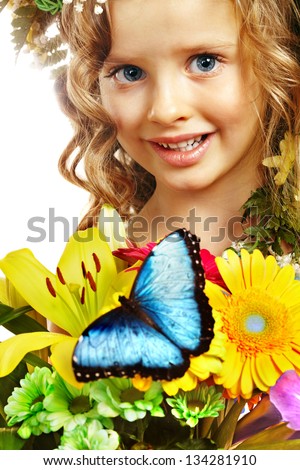 Face of child with flower and butterfly. Isolated.