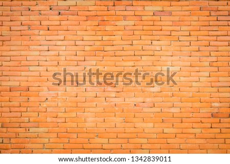 Orange brick wall antique texture background. Abstract brickwork or design brickwall stonework flooring interior Include rock old pattern clean have concrete grid uneven bricks stack backdrop.