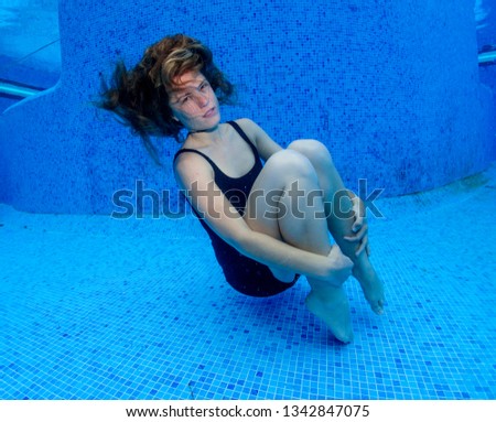 Underwater model in the pool